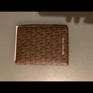 Michael Kors brand new wallet/card book
